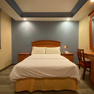 Habitación Estándar con Cama Queen